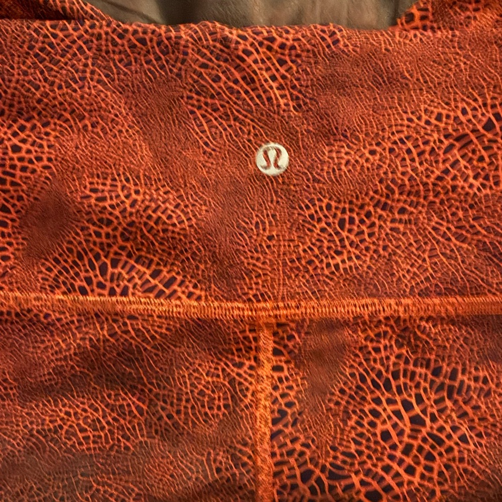 lululemon athletica Orange Patterned Leggings EUC size 14
